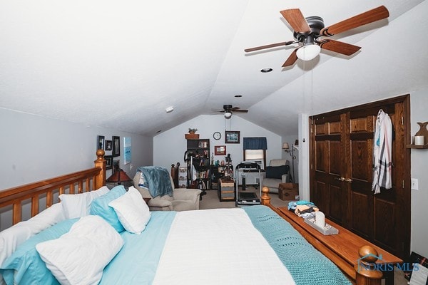 bedroom featuring lofted ceiling and ceiling fan