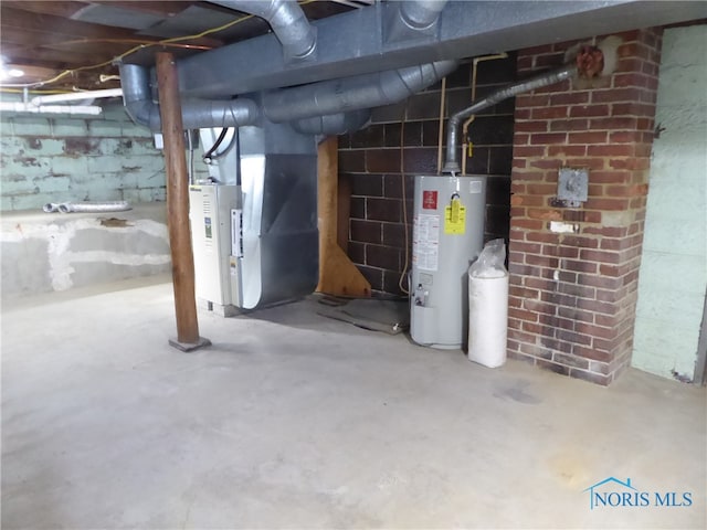 basement featuring gas water heater and heating unit