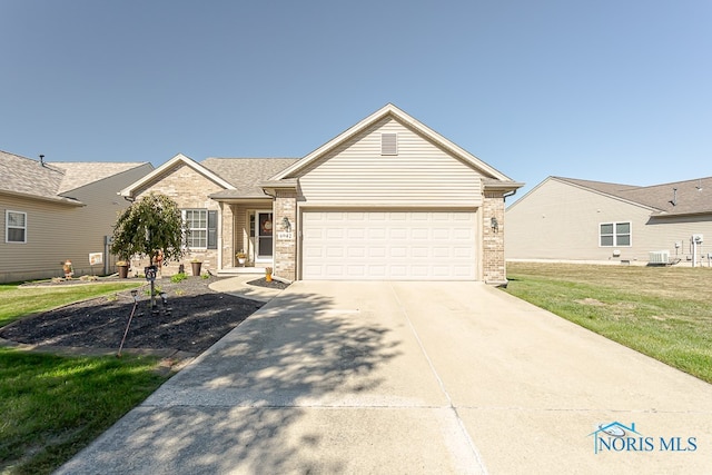 ranch-style home featuring central AC, a front yard, and a garage