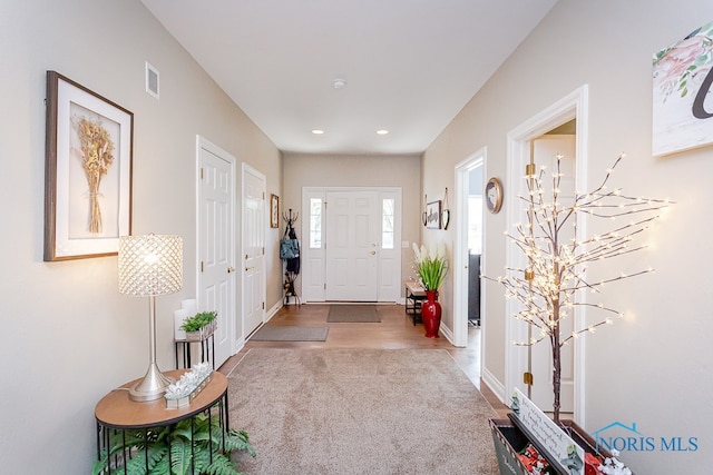 entrance foyer featuring hardwood / wood-style flooring