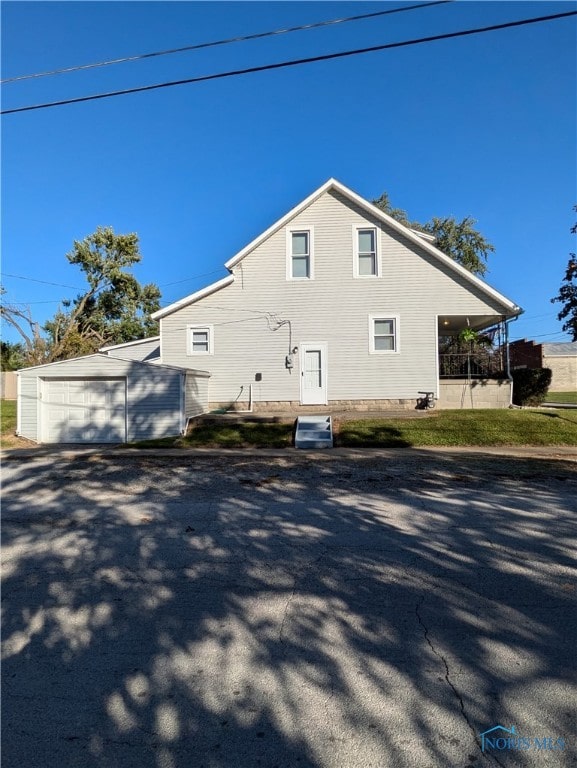 view of home's exterior with a garage