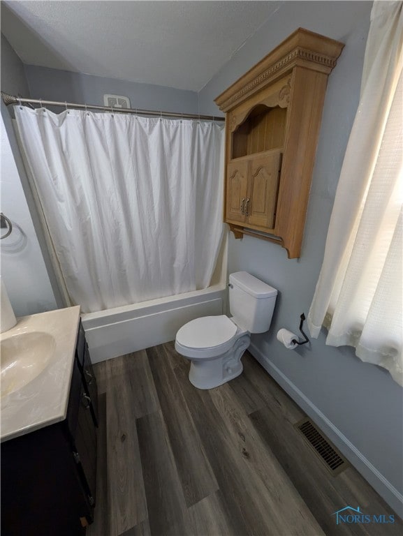 full bathroom with shower / bath combination with curtain, vanity, toilet, and wood-type flooring