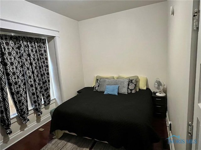 bedroom featuring hardwood / wood-style floors