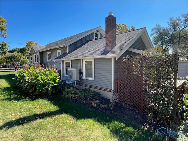 view of front of home with a front yard