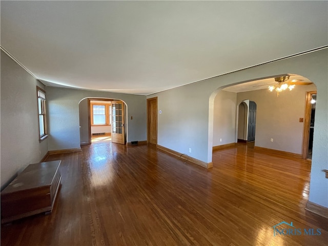 unfurnished room featuring wood-type flooring and ceiling fan