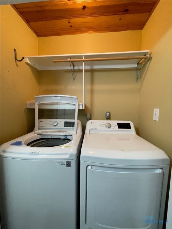 laundry area featuring independent washer and dryer