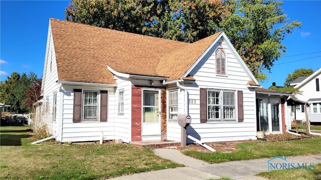 view of front of house with a front yard