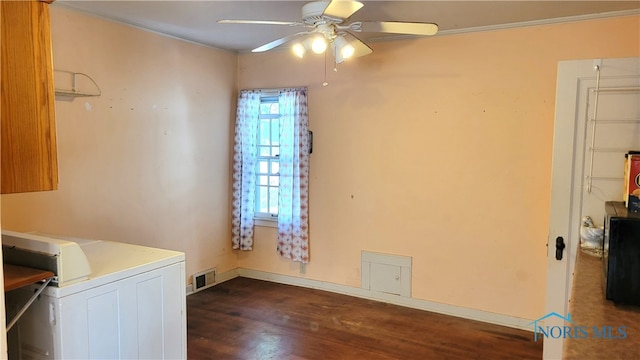 laundry area with dark hardwood / wood-style floors, washer / dryer, and ceiling fan