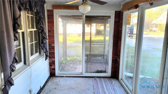 entryway featuring ceiling fan