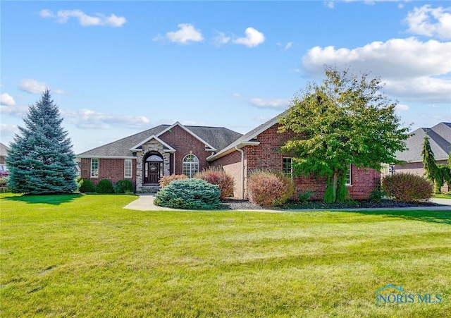 view of front of home with a front lawn