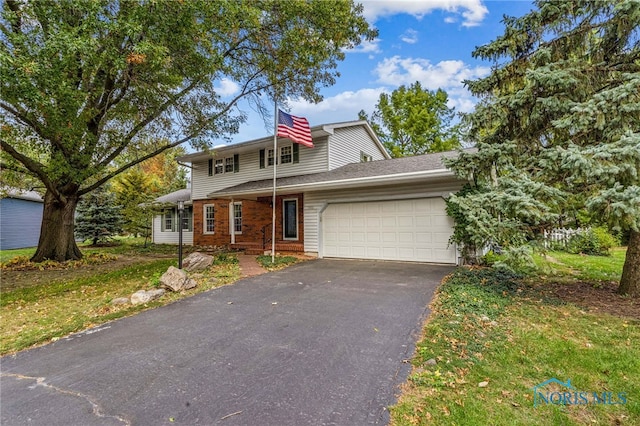 view of front of property featuring a garage