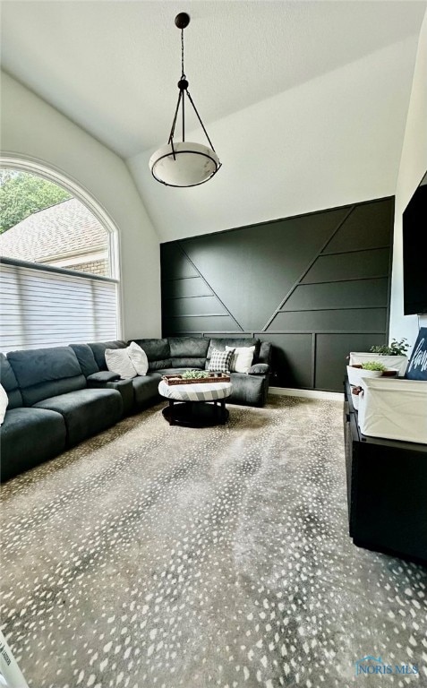 living room with lofted ceiling