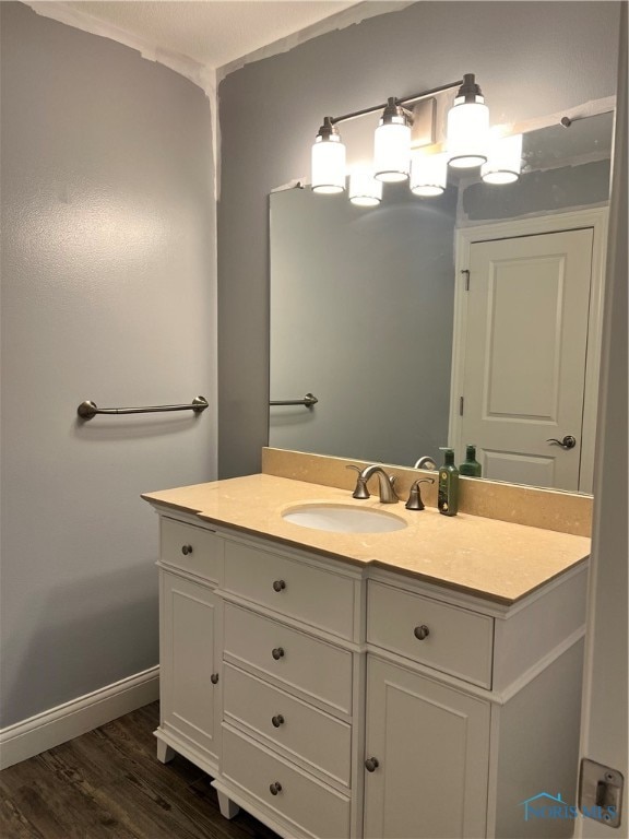 bathroom featuring vanity and hardwood / wood-style flooring