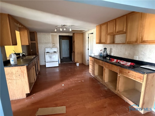 kitchen with decorative backsplash, white range oven, sink, and dark hardwood / wood-style flooring