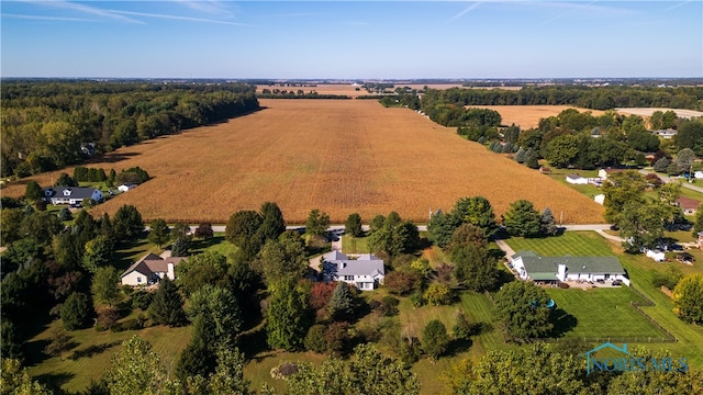 birds eye view of property with a rural view