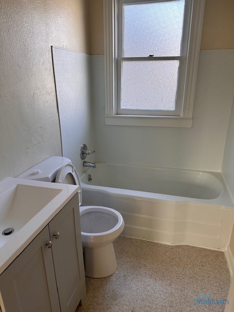 full bathroom featuring toilet, shower / washtub combination, and vanity