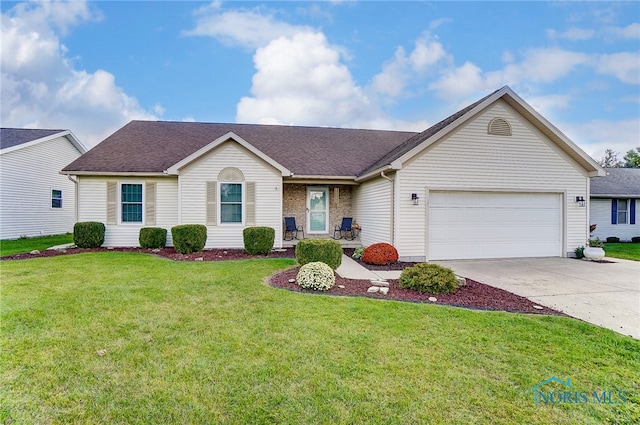 ranch-style home featuring a front yard and a garage