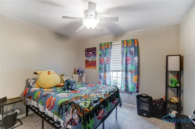 bedroom with ceiling fan and light carpet