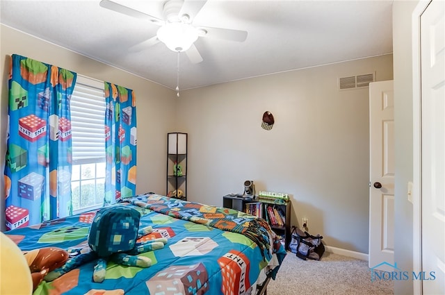 carpeted bedroom featuring ceiling fan