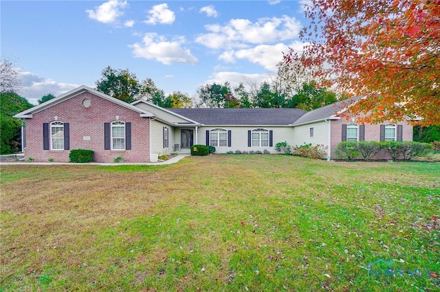 ranch-style house with a front lawn