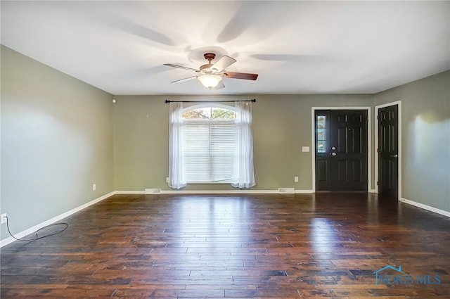 entrance foyer with ceiling fan and dark hardwood / wood-style flooring