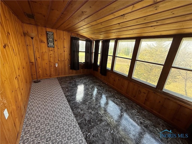 unfurnished sunroom with wood ceiling and vaulted ceiling