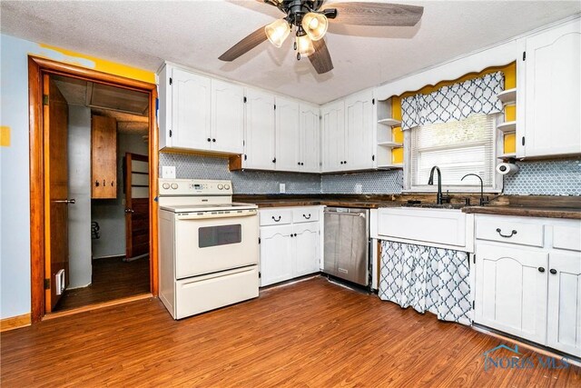 kitchen featuring decorative backsplash, white electric range, wood-type flooring, stainless steel dishwasher, and white cabinets