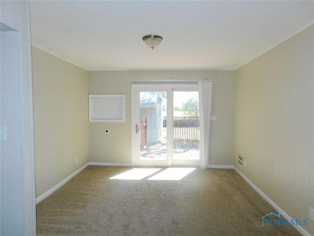 view of carpeted spare room