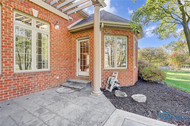 doorway to property featuring a patio