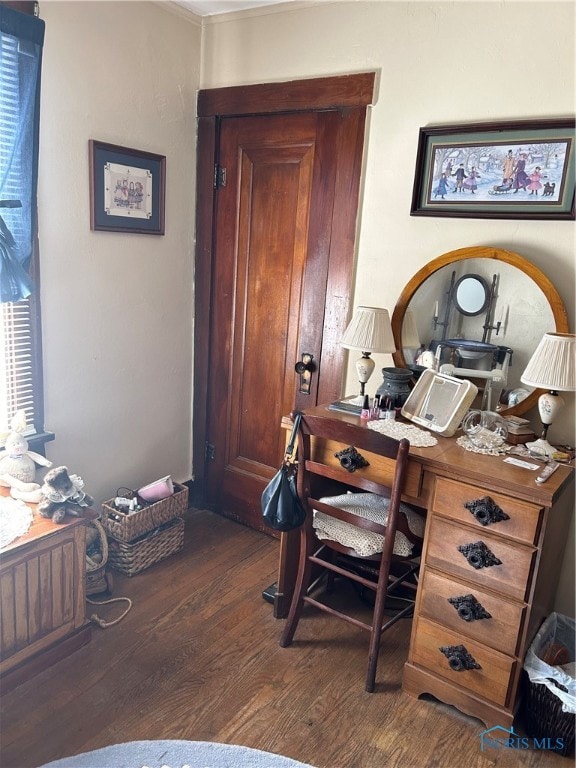 home office with dark wood-type flooring