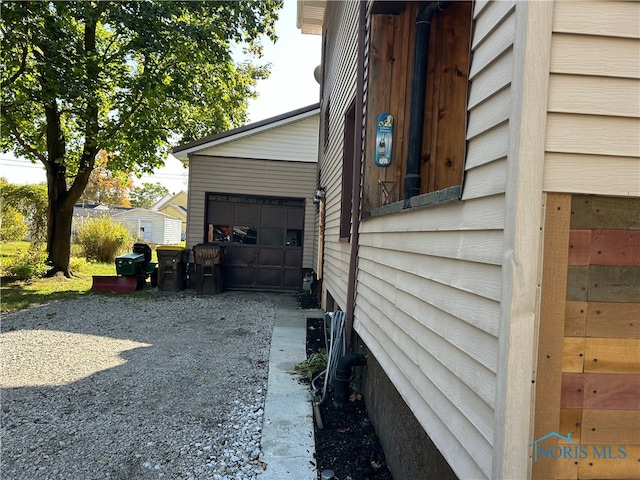 view of home's exterior featuring a garage