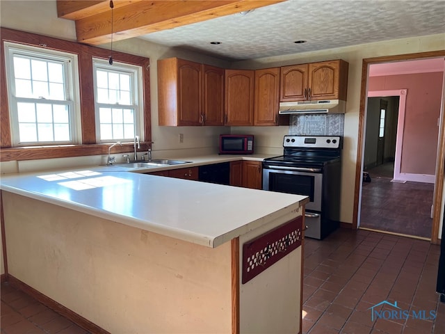 kitchen featuring black appliances, sink, a textured ceiling, kitchen peninsula, and pendant lighting