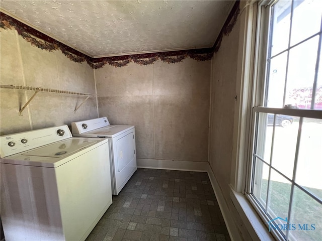 laundry area with washer and clothes dryer