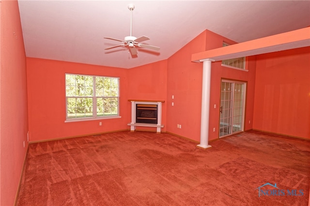 unfurnished living room with ceiling fan, vaulted ceiling, and carpet floors