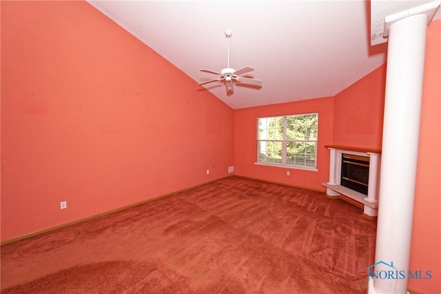 unfurnished living room with ceiling fan, lofted ceiling, and carpet floors