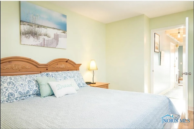 bedroom featuring wood-type flooring