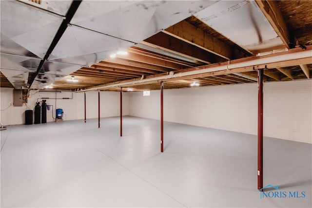 basement with electric panel