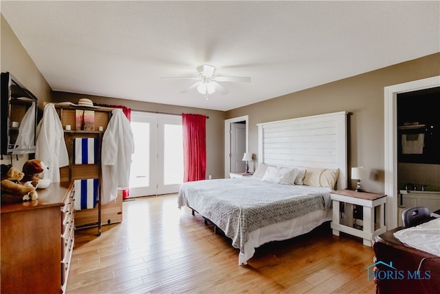 bedroom featuring light hardwood / wood-style floors and ceiling fan