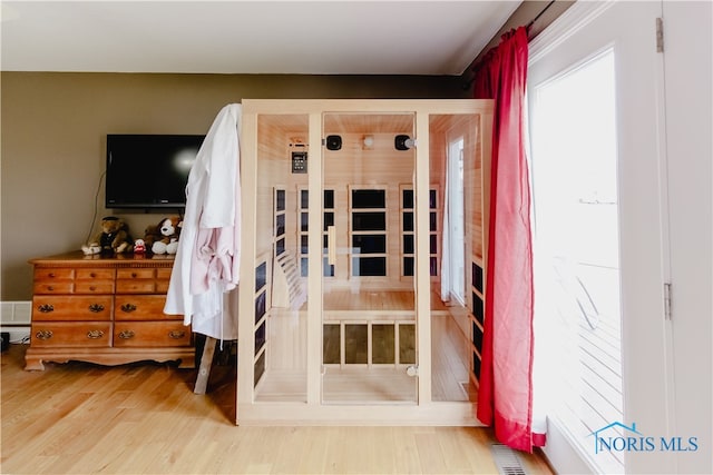 bedroom featuring hardwood / wood-style floors