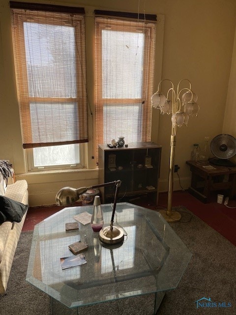 dining room featuring carpet and a wealth of natural light