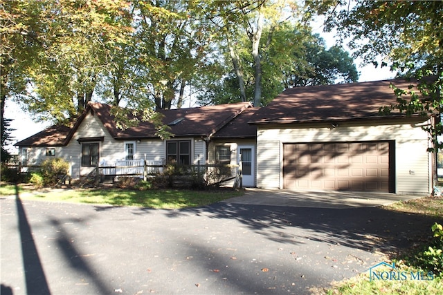 single story home featuring a garage