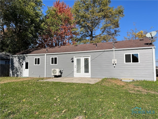 back of house with a yard, a patio, and ac unit