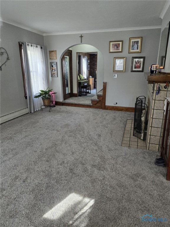 carpeted living room featuring ornamental molding and a baseboard heating unit