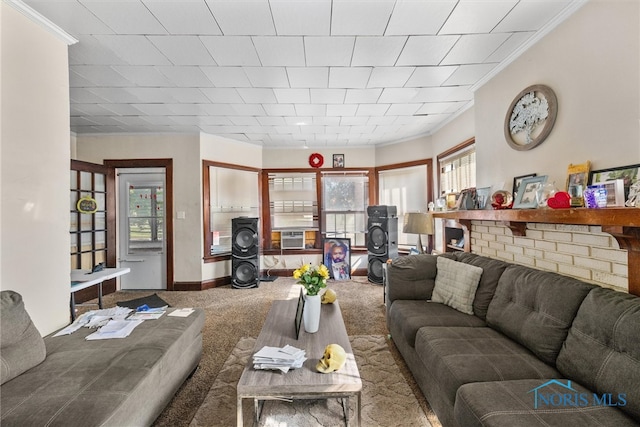 living room featuring crown molding and carpet floors