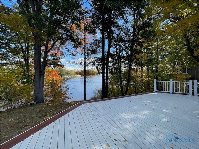 deck featuring a water view