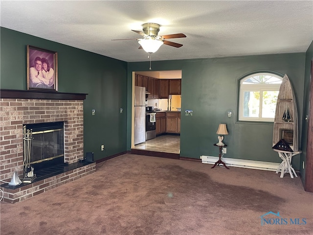 carpeted living room featuring a baseboard radiator, a brick fireplace, a textured ceiling, and ceiling fan