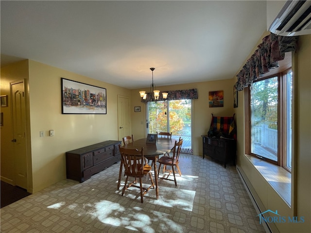 dining room with an inviting chandelier, a wall mounted air conditioner, and a baseboard heating unit