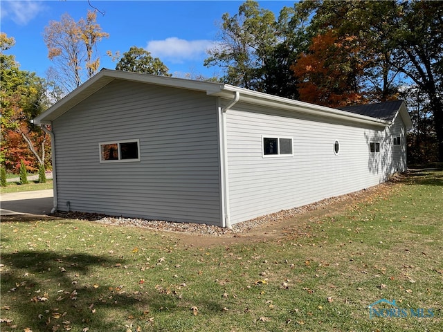 view of property exterior featuring a yard