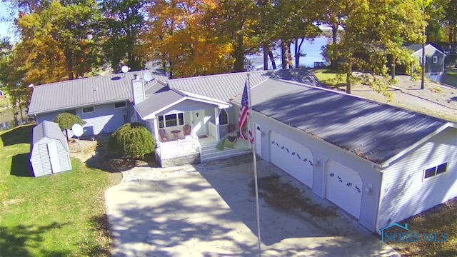 exterior space with a front lawn and a garage