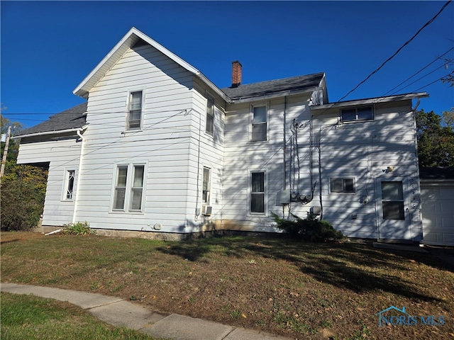 exterior space featuring a front lawn